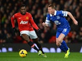 Everton's James McCarthy and Man United's Danny Welbeck in action during their Premier League match on December 4, 2013 