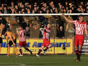 Sheffield United's Jamie Murphy celebrates after scoring his team's second goal against Cambridge during their FA Cup second round match on December 8, 2013