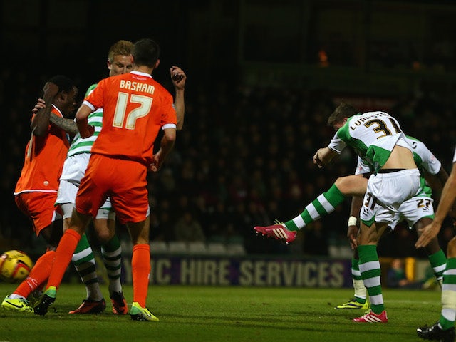John Lundstram of Yeovil Town scores the opening goal during the Sky Bet Championship match between Yeovil Town and Blackpool at Huish Park on December 03, 2013