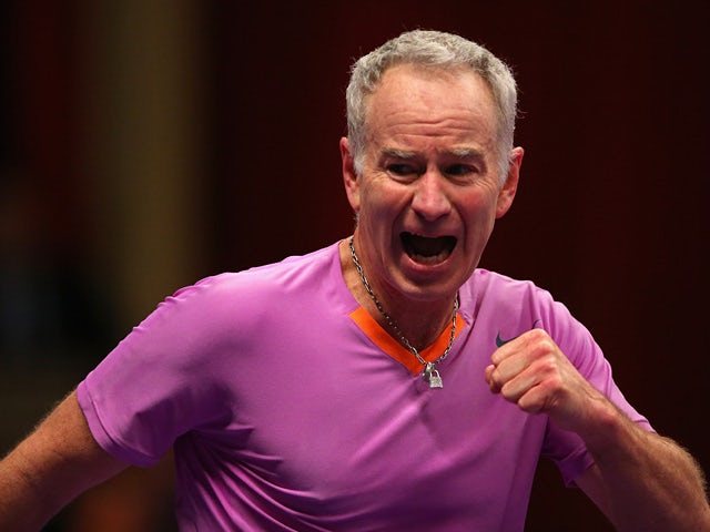 John McEnroe reacts during day two of his Statoil Masters Tennis match against Wayne Ferreira on December 5, 2013