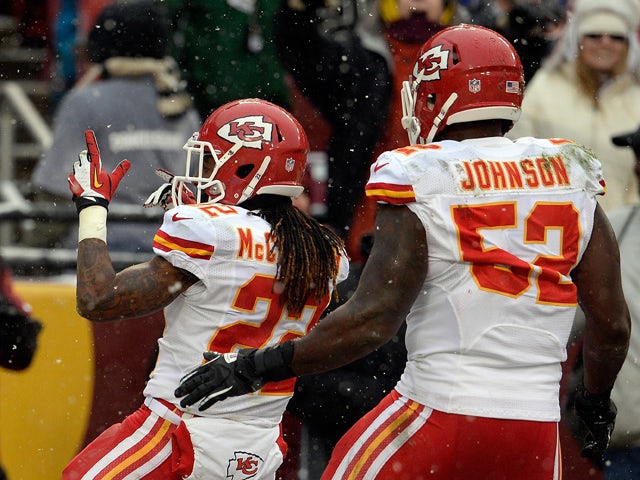 Dexter McCluster #22 of the Kansas City Chiefs celebrates after returning a punt for a touchdown in the second quarter during an NFL game against the Washington Redskins at FedExField on December 8, 2013