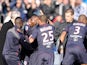 Bordeaux's Landry Nguemo celebrates with teammates after scoring the opening goal against Lille during their Ligue 1 match on December 8, 2013