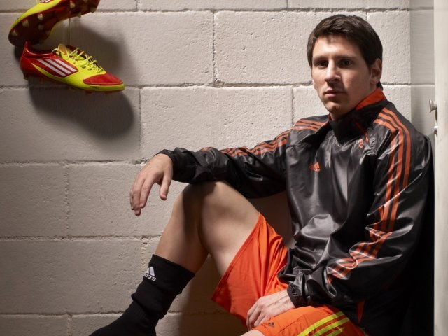 Lionel Messi poses for the cover of Guillem Balague's book 'Messi'.