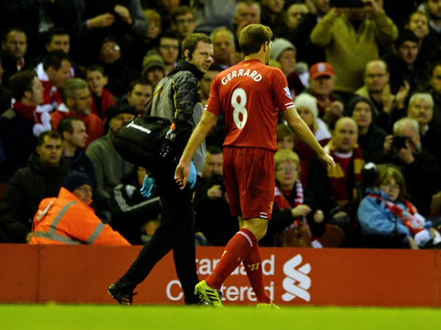 Liverpool's English midfielder Steven Gerrard is substituted during the English Premier League football match between Liverpool and West Ham United at Anfield in Liverpool on December 7, 2013