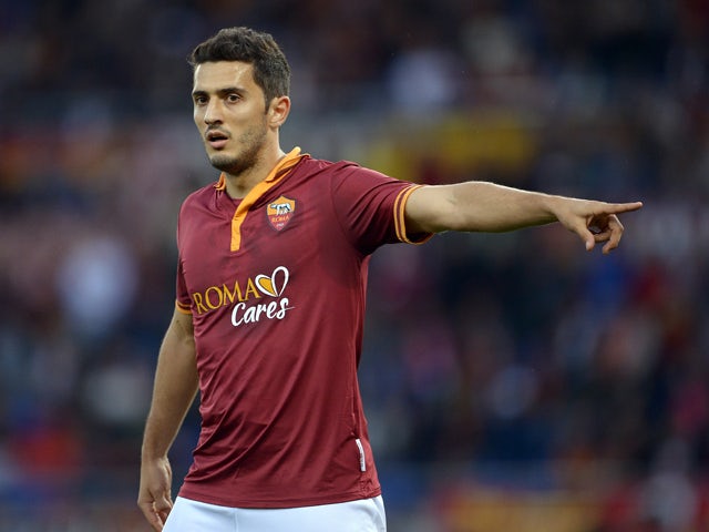AS Roma's Brazilian midfielder Marquinho gestures during the Italian Serie A football match between AS Roma and Sassuolo at Rome's Olympic stadium on November 10, 2013