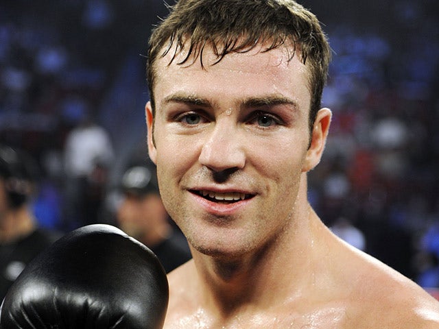 Matthew Macklin celebrates victory after defeating Joachim Alcine in their middleweight fight in Las Vegas on September 15, 2012