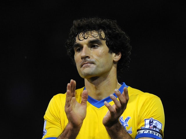 Crystal Palace captain Mile Jedinak applauds the fans after the Barclays Premier League match between West Bromwich Albion and Crystal Palace at The Hawthorns on November 2, 2013