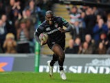 Leicester Tigers' Miles Benjamin runs in to score a try against Montpellier during their Heineken Cup match on December 8, 2013