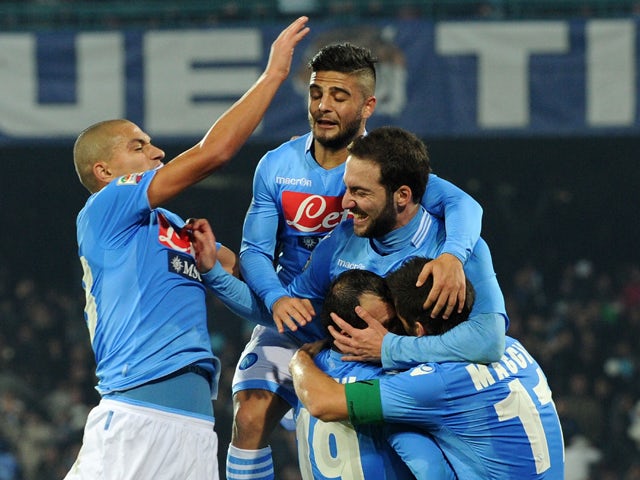 Goran Pandev of Napoli celebrates after scoring his second goal during the Serie A match between SSC Napoli and Udinese Calcio at Stadio San Paolo on December 7, 2013