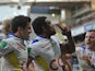 Clermont-Auvergne's Napolioni Nalaga celebrates with teammates after scoring a try against Llanelli Scarlets during their Heineken Cup match on December 7, 2013