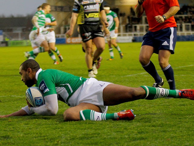 Newcastle Falcons' Noah Cato scores a try against Calvisano during their Amlin Challenge Cup match on December 8, 2013