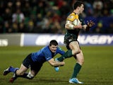 Brian O'Driscoll of Leinster tackles George North of Northampton during the Heineken Cup match between Northampton Saints and Leinster Rugby at Franklin's Gardens on December 7, 2013