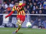 Barcelona's Pedro Rodriguez scores his team's opening goal against Cartagena during their Copa del Rey match on December 6, 2013