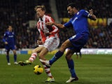 Cardiff's Steven Caulker and Stoke's Peter Crouch in action during their Premier League match on December 4, 2013