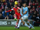 Pablo Daniel Osvaldo of Southampton shoots to score the equalising goal during the Barclays Premier League match between Southampton and Manchester City at St Mary's Stadium on December 7, 2013