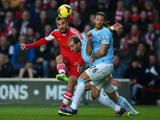 Pablo Daniel Osvaldo of Southampton shoots to score the equalising goal during the Barclays Premier League match between Southampton and Manchester City at St Mary's Stadium on December 7, 2013
