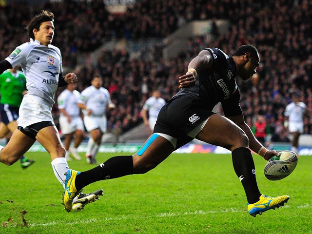Leicester Tigers' Vereniki Goneva scores the opening try against Montpellier during their Heineken Cup match on December 8, 2013