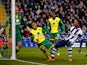 Stephane Sessegnon of West Bromwich has his shot on goal blocked by the arm of Martin Olsson of Norwich during the Barclays Premier League match between West Bromwich Albion and Norwich City at The Hawthorns on December 7, 2013