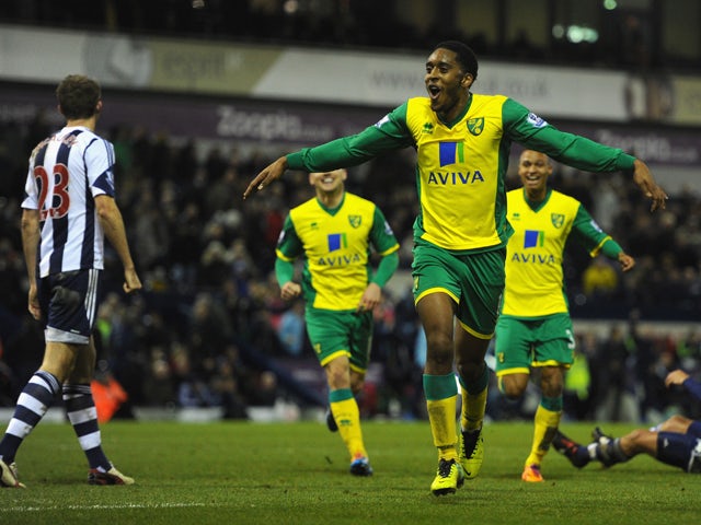 Norwich player Leroy Fer celebrates after scoring the second goal during the Barclays Premier League match between West Bromwich Albion and Norwich City at The Hawthorns on December 7, 2013