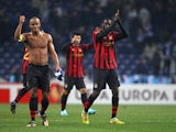 Yaya Toure and Vincent Kompany of Manchester City celebrate after victory over FC Porto in the UEFA Europa League round of 32 first leg match between FC Porto and Manchester City at Estadio do Dragao on February 16, 2012