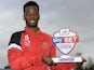 Dag & Red striker Zavon Hines with his League Two Player of the Month award on December 5, 2013
