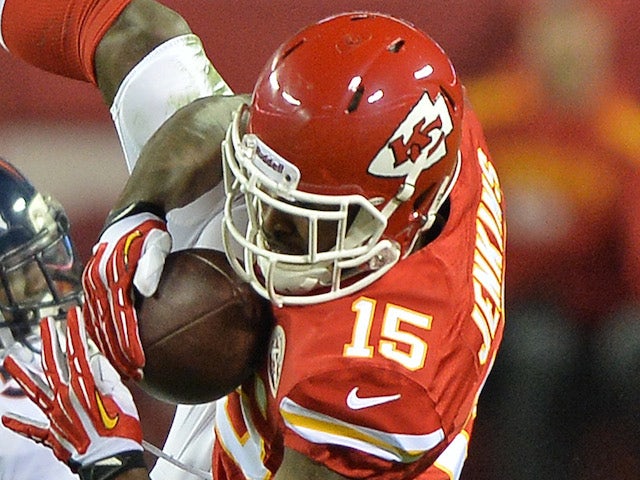 Wide receiver A.J. Jenkins #15 of the Kansas City Chiefs makes a catch against Denver Broncos on December 14, 2013