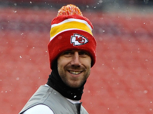 Quarterback Alex Smith of the Kansas City Chiefs warms up prior to playing an NFL game against the Washington Redskins at FedExField on December 8, 2013