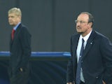 Arsenal's French manager Arsene Wenger and Napoli's Spanish coach Rafael Benitez look on during the UEFA Champions League group F football match between their sides on December 11, 2013