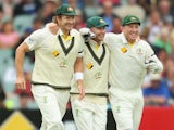 Shane Watson, Michael Clarke and Brad Haddin of Australia celebrate as they win the match during day five of Second Ashes Test Match between Australia and England at Adelaide Oval on December 9, 2013