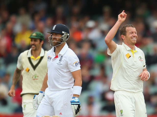 Peter Siddle of Australia celebrates after dismissing Matt Prior of England during day five of Second Ashes Test Match between Australia and England at Adelaide Oval on December 9, 2013