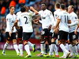 Danny Welbeck of Manchester United is by congratulated by Rafael da Silva and team mates as he scores their first goal during the Barclays Premier League match between Aston Villa and Manchester United at Villa Park on December 15, 2013