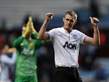 Manchester United's Scottish midfielder Darren Fletcher gestures to the crowd at the end of the English Premier League football match between Aston Villa and Manchester United at Villa Park in Birmingham on December 15, 2013