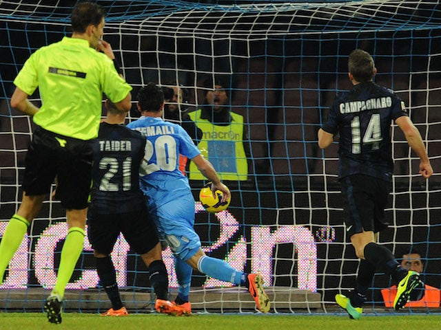 Blerim Dzemaili of Napoli scores his team's third goal during the Serie A match between SSC Napoli vs FC Internazionale Milano at Stadio San Paolo on December 15, 2013