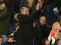 Jose Mourinho manager of Chelsea applauds the Crystal Palace fans at the final whistle during the Barclays Premier League match between Chelsea and Crystal Palace at Stamford Bridge on December 14, 2013