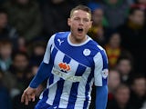 Connor Wickham of Sheffield Wedneday celebrates after scoring the opening goal from a free-kick during the Sky Bet Championship match against Watford on December 14, 2013