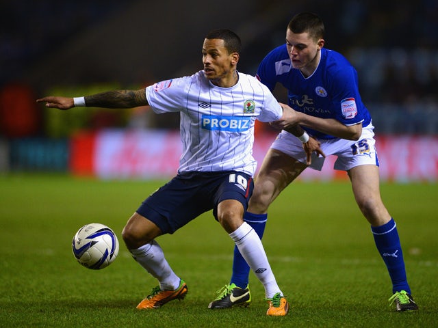 DJ Campbell of Blackburn battles Michael Keane of Leicester during the npower Championship match between Leicester City and Blackburn Rovers at The King Power Stadium on February 26, 2013