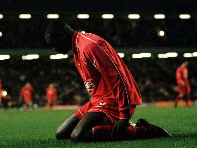 Liverpool striker Emile Heskey reacts to missing a chance against Ipswich Town on December 10, 2000.