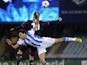 Leverkusen's midfielder Emre Can (L) vies with Real Sociedad's defender Carlos Martinez during the UEFA Champions League Group A football match Real Sociedad de Futbol vs Bayer 04 Leverkusen on December 10, 2013