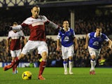 Dimitar Berbatov of Fulham scores his team's first goal from the penalty spot during the Barclays Premier League match between Everton and Fulham at Goodison Park on December 14, 2013