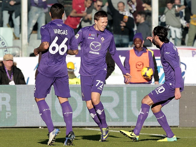 Josip Ilicic of ACF Fiorentina celebrates after scoring a goal during the Serie A match between ACF Fiorentina and Bologna FC at Stadio Artemio Franchi on December 15, 2013