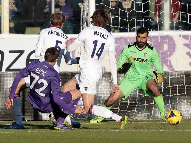 Josip Ilicic of ACF Fiorentina scores the opening goal during the Serie A match between ACF Fiorentina and Bologna FC at Stadio Artemio Franchi on December 15, 2013