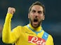 Napoli's Argentinian forward Gonzalo Higuain celebrates his goal during the UEFA Champion's League group F football match against Arsenal FC on December 11, 2013