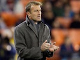 Head coach Jason Kreis of the Real Salt Lake applauds his team from the sideline during the first half against the D.C. United at RFK Stadium on March 9, 2013