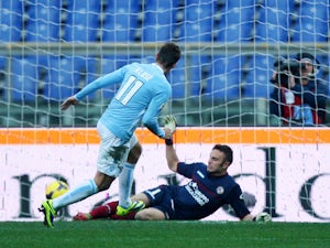 Miroslav Klose of SS lazio scores the second team's goal during the Serie A match between SS Lazio and AS Livorno at Stadio Olimpico on December 15, 2013