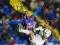 Juanfran Garcia of Levante UD competes for the ball with Ferran Corominas of Elche FC during the La Liga match between Levante UD and Elche FC at Ciutat de Valencia on December 13, 2013