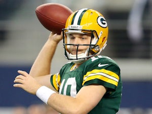 Quarterback Matt Flynn of the Green Bay Packers passes against the Dallas Cowboys during a game at AT&T Stadium on December 15, 2013
