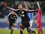 Leverkusen's Turkish defender Oemer Toprak celebrates after scoring his team's first goal during the UEFA Champions League Group A football match against Real Sociedad de Futbol on December 10, 2013