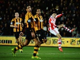 Oussama Assaidi of Stoke City shoots during the Barclays Premier League match between Hull City and Stoke City at KC Stadium on December 14, 2013