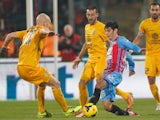 Pablo Barrientos (R) of Catania competes for the ball with Emil Halfredsson of Hellas Verona during the Serie A match on December 14, 2013