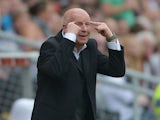 Dundee United manager Peter Houston passing instructions to his players during the Scottish Premier League match between Dundee United and Dundee at Tannadice Park on August 19, 2012